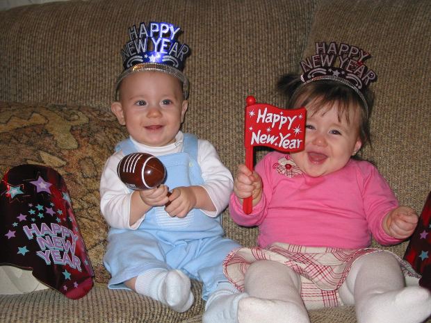 happy new years children hats flags